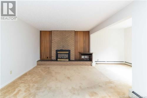 297 Wright Street, Fredericton, NB - Indoor With Fireplace