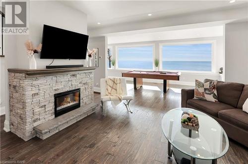 2952 North Shore Drive, Lowbanks, ON - Indoor Photo Showing Living Room With Fireplace