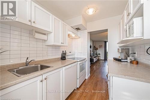 631 - 350 Quigley Road E, Hamilton (Vincent), ON - Indoor Photo Showing Kitchen