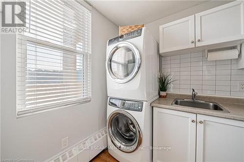 631 - 350 Quigley Road E, Hamilton (Vincent), ON - Indoor Photo Showing Laundry Room