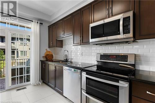 215 Dundas Street E Unit# 10, Waterdown, ON - Indoor Photo Showing Kitchen With Stainless Steel Kitchen