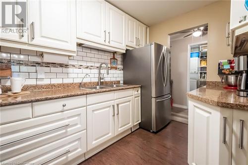 6 Niagara Street Unit# 105, Grimsby, ON - Indoor Photo Showing Kitchen With Double Sink