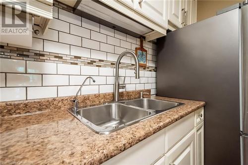 6 Niagara Street Unit# 105, Grimsby, ON - Indoor Photo Showing Kitchen With Double Sink