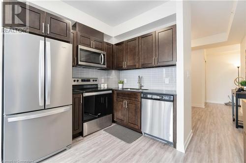 128 King Street N Unit# 1208, Waterloo, ON - Indoor Photo Showing Kitchen With Stainless Steel Kitchen