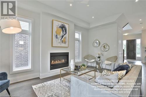 91 Aquasanta Crescent, Hamilton, ON - Indoor Photo Showing Living Room With Fireplace