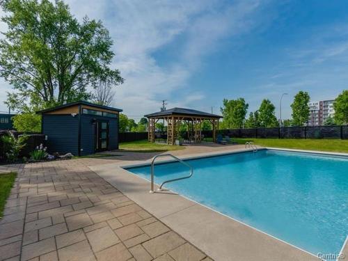 Pool - 602-41 Rue Simon-Lussier, Blainville, QC - Outdoor With In Ground Pool With Backyard