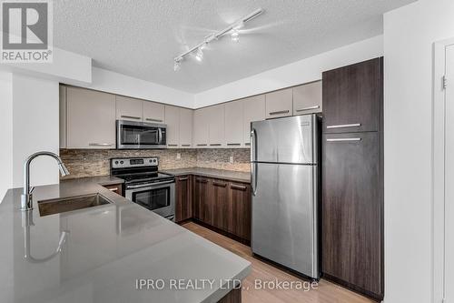 505 - 11 St Joseph Street, Toronto (Bay Street Corridor), ON - Indoor Photo Showing Kitchen With Stainless Steel Kitchen With Upgraded Kitchen