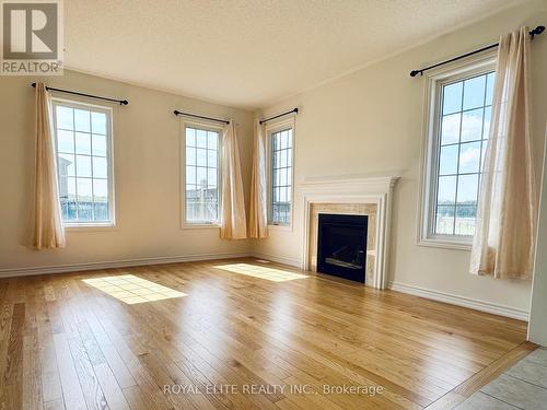 52 Lampkin Street, Georgina, ON - Indoor Photo Showing Living Room With Fireplace