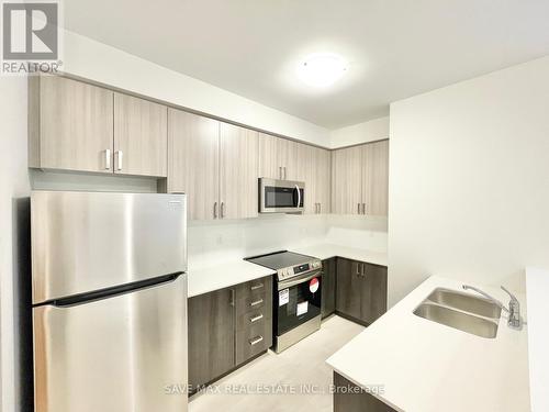 1402 - 1856 Notion Road, Pickering (Village East), ON - Indoor Photo Showing Kitchen With Stainless Steel Kitchen With Double Sink