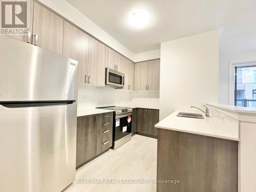 1402 - 1856 Notion Road, Pickering (Village East), ON - Indoor Photo Showing Kitchen With Stainless Steel Kitchen With Double Sink