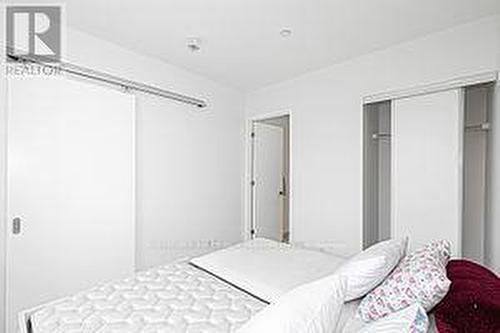 405 - 6 Sonic Way, Toronto, ON - Indoor Photo Showing Bedroom