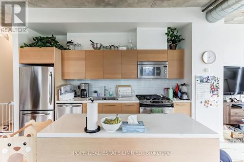 716 - 318 King Street E, Toronto, ON - Indoor Photo Showing Kitchen With Double Sink