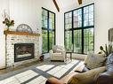 Salon - 142 Ch. Paquin, Sainte-Anne-Des-Lacs, QC  - Indoor Photo Showing Living Room With Fireplace 