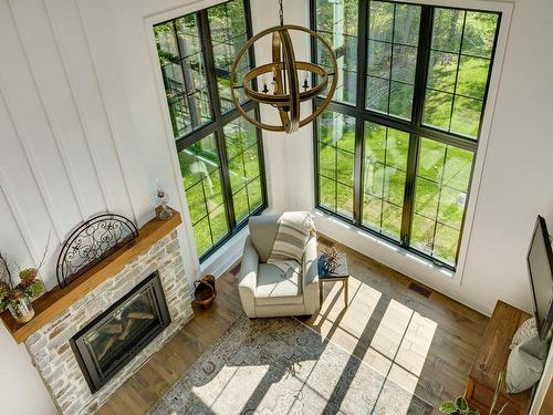 Vue d'ensemble - 142 Ch. Paquin, Sainte-Anne-Des-Lacs, QC - Indoor Photo Showing Other Room With Fireplace