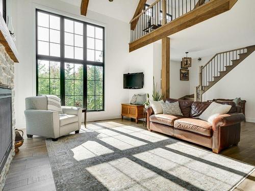 Salon - 142 Ch. Paquin, Sainte-Anne-Des-Lacs, QC - Indoor Photo Showing Living Room With Fireplace