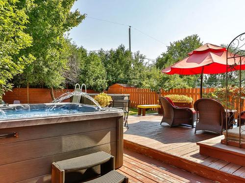 Hot tub - 3229 Rue Plante, Longueuil (Saint-Hubert), QC - Outdoor With Above Ground Pool With Deck Patio Veranda