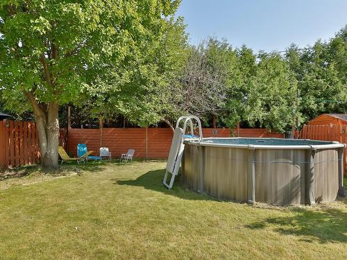 Piscine - 3229 Rue Plante, Longueuil (Saint-Hubert), QC - Outdoor With Above Ground Pool With Backyard