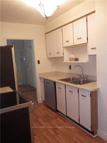 102-4005 Don Mills Rd, Toronto, ON - Indoor Photo Showing Kitchen With Double Sink