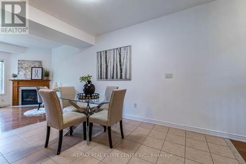 1337 Kestell Boulevard W, Oakville (Iroquois Ridge North), ON - Indoor Photo Showing Dining Room With Fireplace