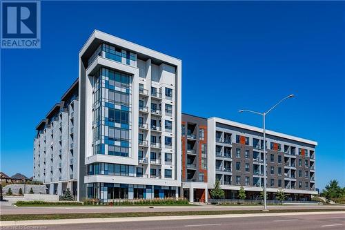 95 Dundas Street W Unit# 109, Oakville, ON - Outdoor With Facade