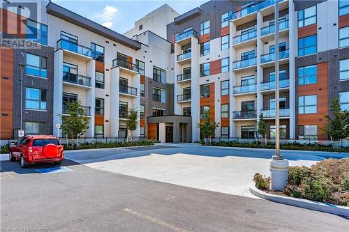 95 Dundas Street W Unit# 109, Oakville, ON - Outdoor With Balcony With Facade