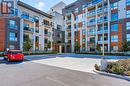 95 Dundas Street W Unit# 109, Oakville, ON  - Outdoor With Balcony With Facade 