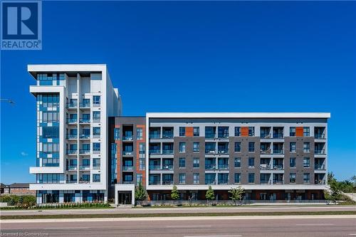 95 Dundas Street W Unit# 109, Oakville, ON - Outdoor With Balcony With Facade