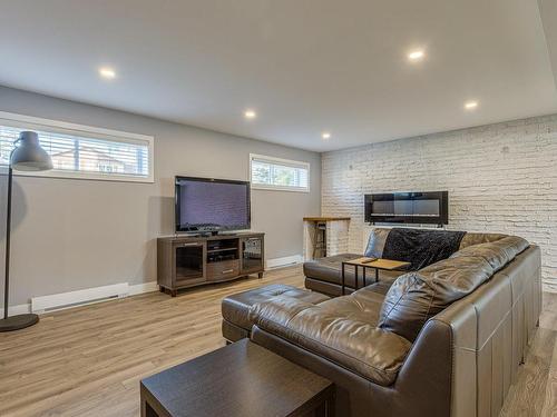 Family room - 19 Rue Lord, Repentigny (Repentigny), QC - Indoor With Fireplace