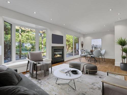 130 Three Valleys Dr, Toronto, ON - Indoor Photo Showing Living Room With Fireplace