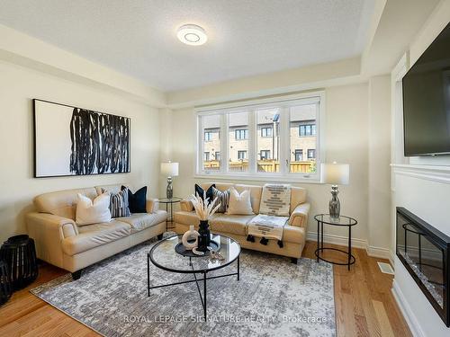 16 Closson Dr, Whitby, ON - Indoor Photo Showing Living Room With Fireplace