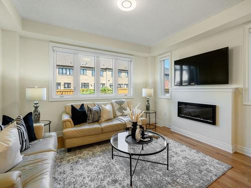 16 Closson Dr, Whitby, ON - Indoor Photo Showing Living Room With Fireplace