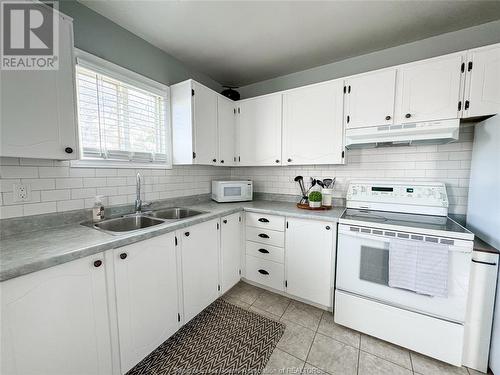 3084 Erindale, Windsor, ON - Indoor Photo Showing Kitchen With Double Sink