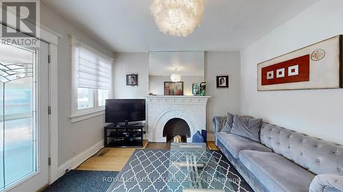 191 Courcelette Road, Toronto, ON - Indoor Photo Showing Living Room With Fireplace