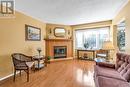 74 - 2275 Credit Valley Road, Mississauga, ON  - Indoor Photo Showing Living Room With Fireplace 