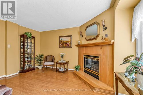 74 - 2275 Credit Valley Road, Mississauga (Central Erin Mills), ON - Indoor Photo Showing Living Room With Fireplace