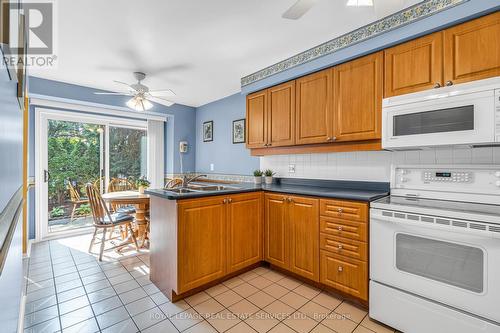 74 - 2275 Credit Valley Road, Mississauga, ON - Indoor Photo Showing Kitchen With Double Sink