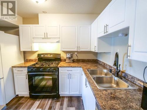 489 Adam Street, Quesnel, BC - Indoor Photo Showing Kitchen With Double Sink