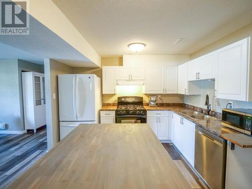 489 Adam Street, Quesnel, BC - Indoor Photo Showing Kitchen With Double Sink