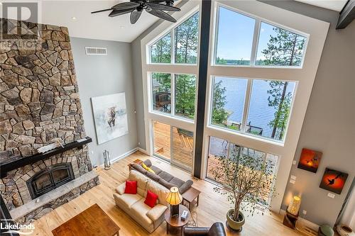 1827 Crystal Lake Road, Trent Lakes, ON - Indoor With Fireplace