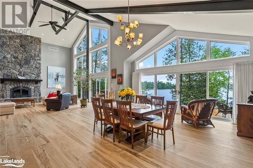 1827 Crystal Lake Road, Trent Lakes, ON - Indoor Photo Showing Dining Room With Fireplace