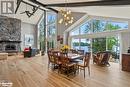 1827 Crystal Lake Road, Trent Lakes, ON  - Indoor Photo Showing Dining Room With Fireplace 