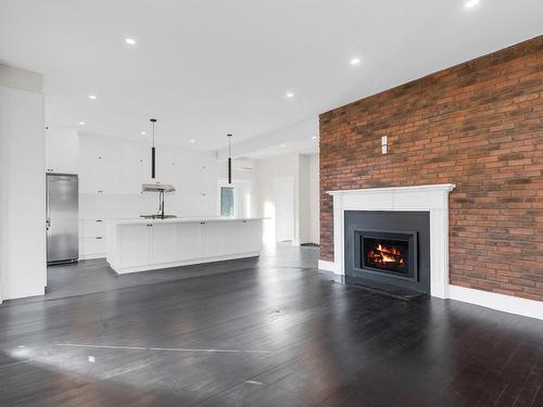 Salle Ã  manger - 2 Rue Du Moulin, Saint-André-D'Argenteuil, QC - Indoor Photo Showing Living Room With Fireplace