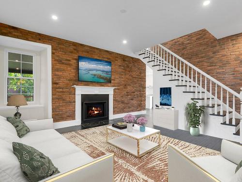 Salle familiale - 2 Rue Du Moulin, Saint-André-D'Argenteuil, QC - Indoor Photo Showing Living Room With Fireplace