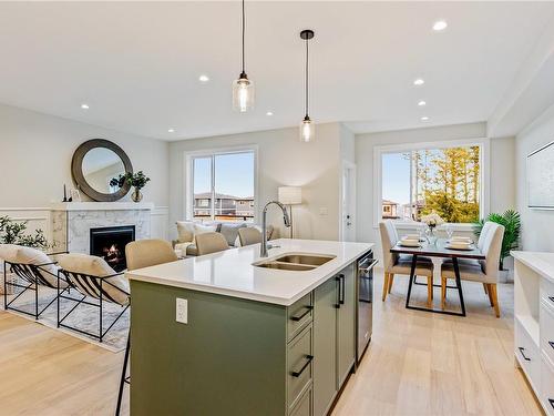 1538 Marble Pl, Langford, BC - Indoor Photo Showing Kitchen With Fireplace With Double Sink