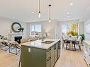 1538 Marble Pl, Langford, BC  - Indoor Photo Showing Kitchen With Fireplace With Double Sink 