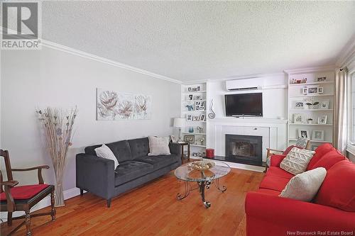 116 Melvin Street, Fredericton, NB - Indoor Photo Showing Living Room With Fireplace