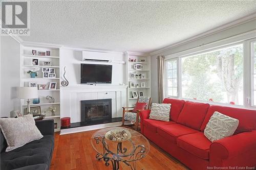 116 Melvin Street, Fredericton, NB - Indoor Photo Showing Living Room With Fireplace