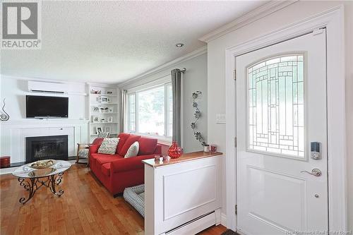 116 Melvin Street, Fredericton, NB - Indoor Photo Showing Living Room With Fireplace