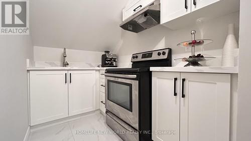 65 Fort Dearborn Drive, Toronto (L'Amoreaux), ON - Indoor Photo Showing Kitchen