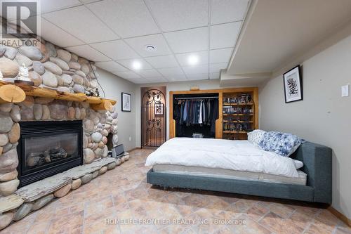 4100 Stonebridge Crescent, Burlington (Rose), ON - Indoor Photo Showing Bedroom With Fireplace